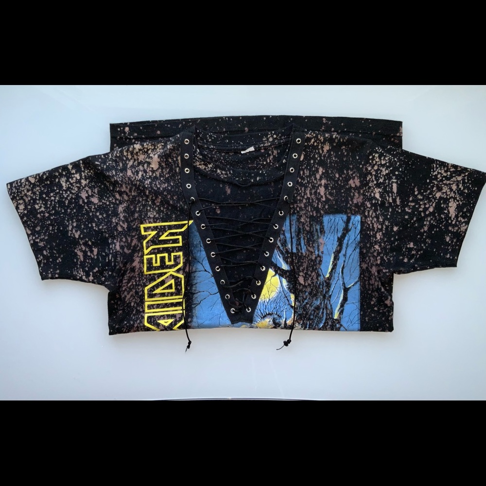 Band t-shirt with an open chest concept and a bleach design